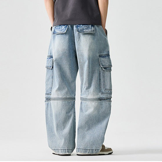 Homixa Caerielle men's heavyweight cargo jeans with loose fit, thigh pockets, and knee seams, shown in a front view.