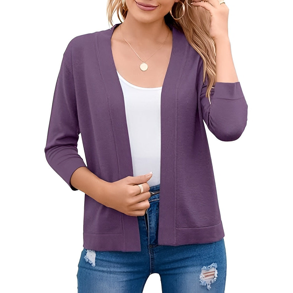 Homixa Caelune women's cropped open-front cardigan with three-quarter sleeves and banded hem, shown on a model.