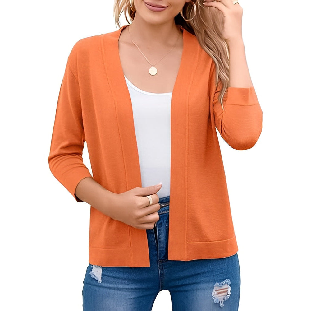 Homixa Caelune women's cropped open-front cardigan with three-quarter sleeves and banded hem, shown on a model.