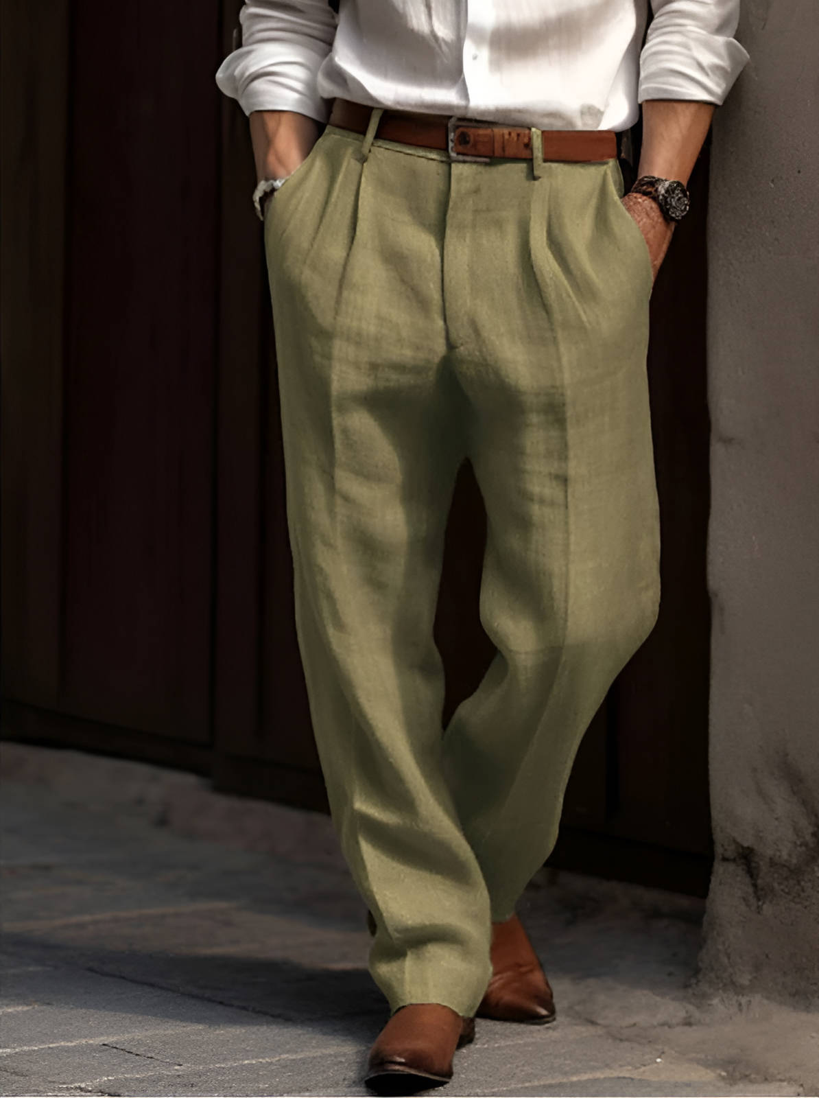 Homixa Delnora men's cotton-linen trousers with straight legs, side pockets, belt loops, and front pleats on a neutral background.