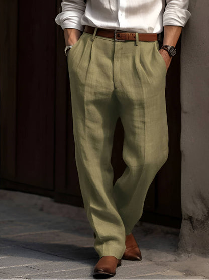 Homixa Delnora men's cotton-linen trousers with straight legs, side pockets, belt loops, and front pleats on a neutral background.