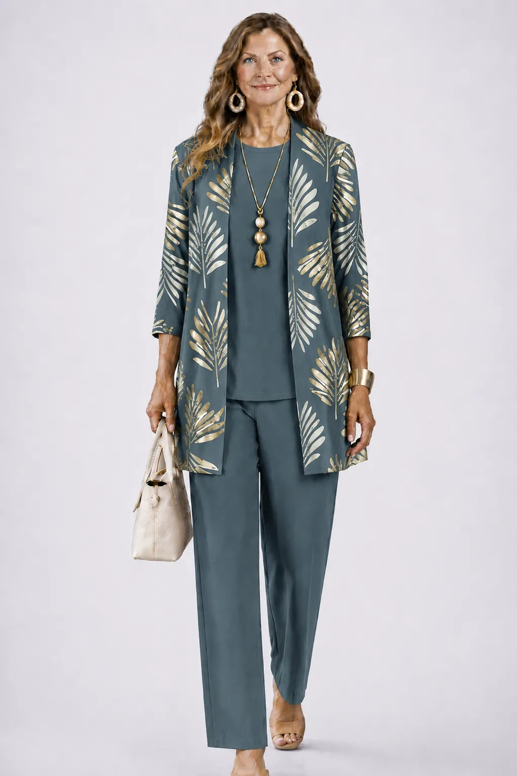 Women's leaf-print long cardigan and 3-piece pant set by Homixa, featuring a stylish, comfortable design with matching coordinated pieces.