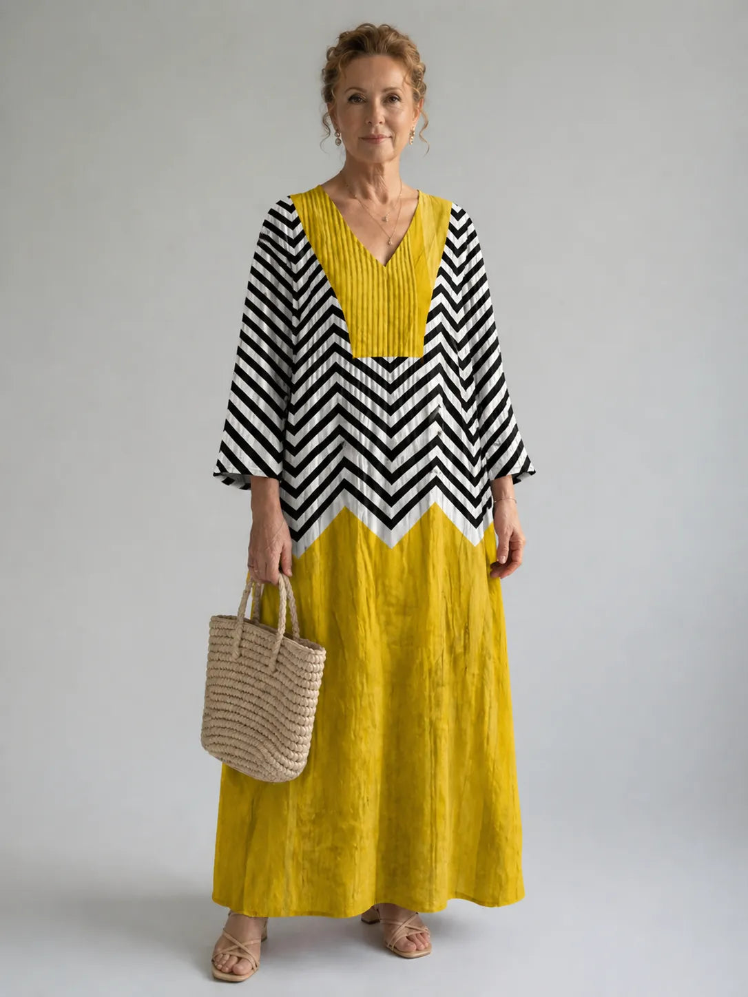 Homixa women's Chevron color-block V-neck maxi dress with sleeveless design and flowing silhouette, perfect for summer wear.