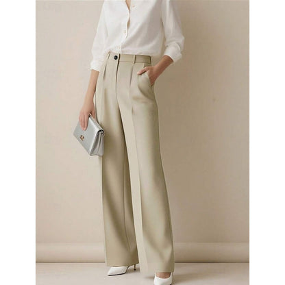 Harper & Wells Odette high-waist tailored trousers featuring a sleek fit and classic design, perfect for professional or casual wear.