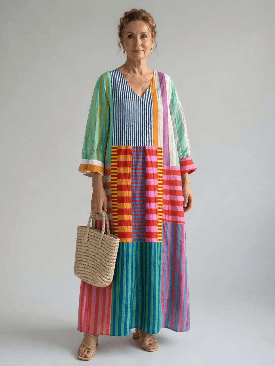 Women's patchwork-stripe V-neck maxi dress by Homixa featuring a flowing design and vibrant pattern, perfect for casual or summer wear.