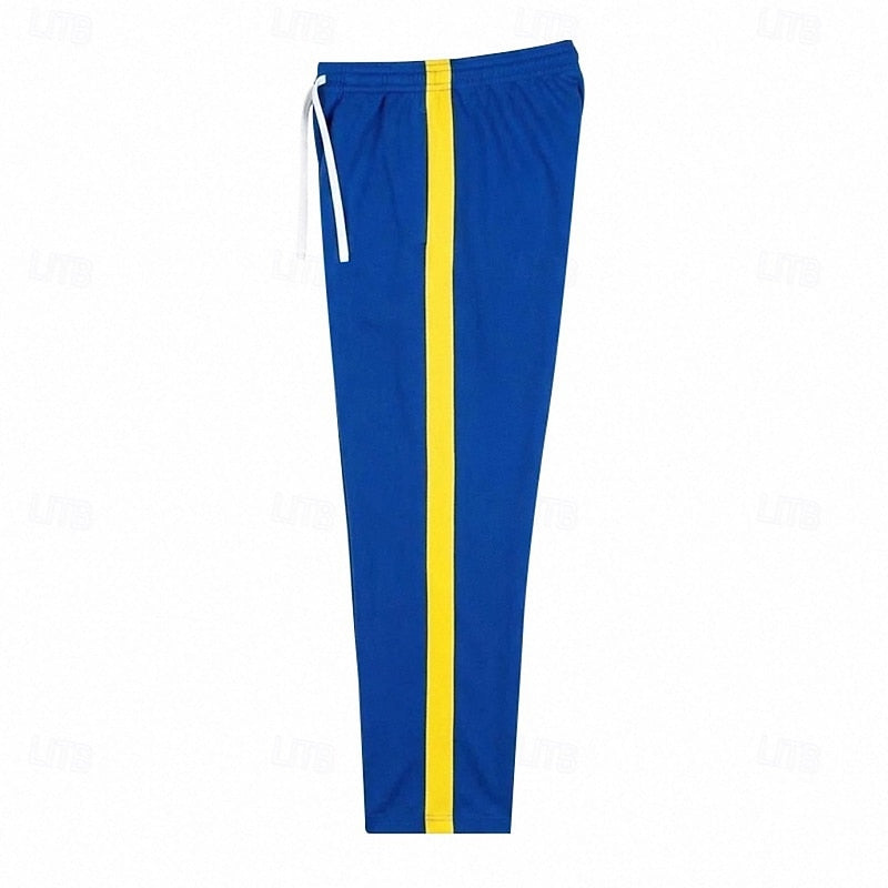 Man wearing Harper & Wells Damian relaxed side-stripe sweatpants, showcasing comfortable fit and stylish side stripe details.