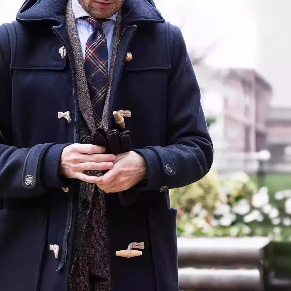 Men's classic duffle coat by Homixa with toggle front, broad collar, and patch pockets, featuring a traditional overcoat style.