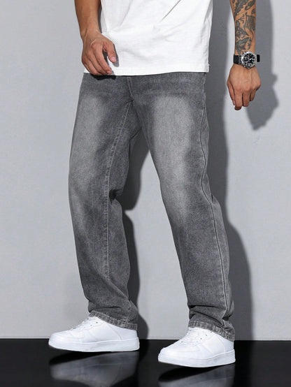 Men's baggy denim jeans by Kate and Wendy featuring a zip fly and five-pocket design, shown on a model.