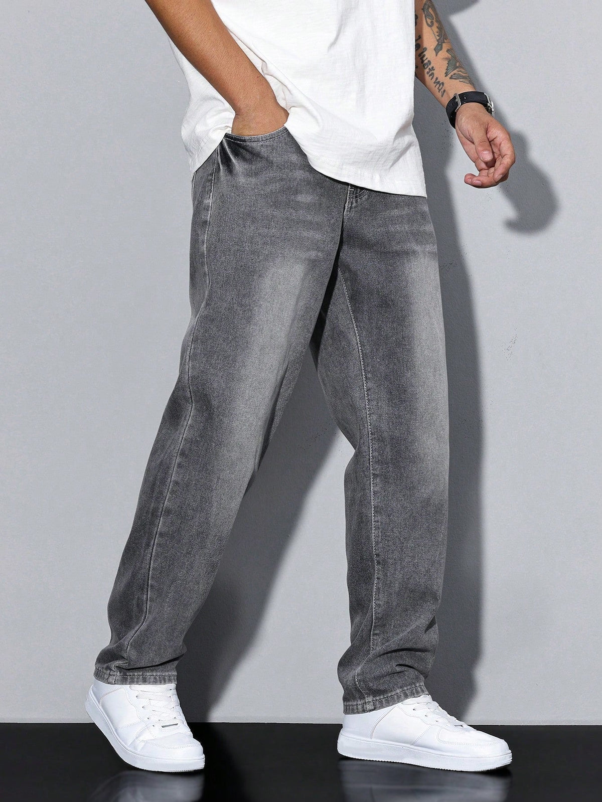 Men's baggy denim jeans with zip fly and five pockets from Kate and Wendy, showcasing relaxed fit and classic jean style.