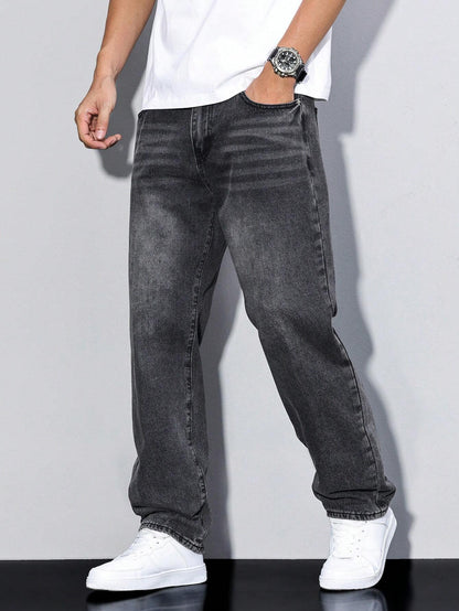 Men's baggy denim jeans by Kate and Wendy featuring a zip fly and five pockets, displayed on a male model.