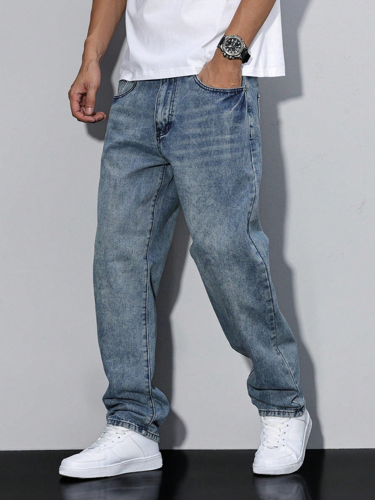 Men's baggy denim jeans by Kate and Wendy with a zip fly and five-pocket design, shown in a casual fit.