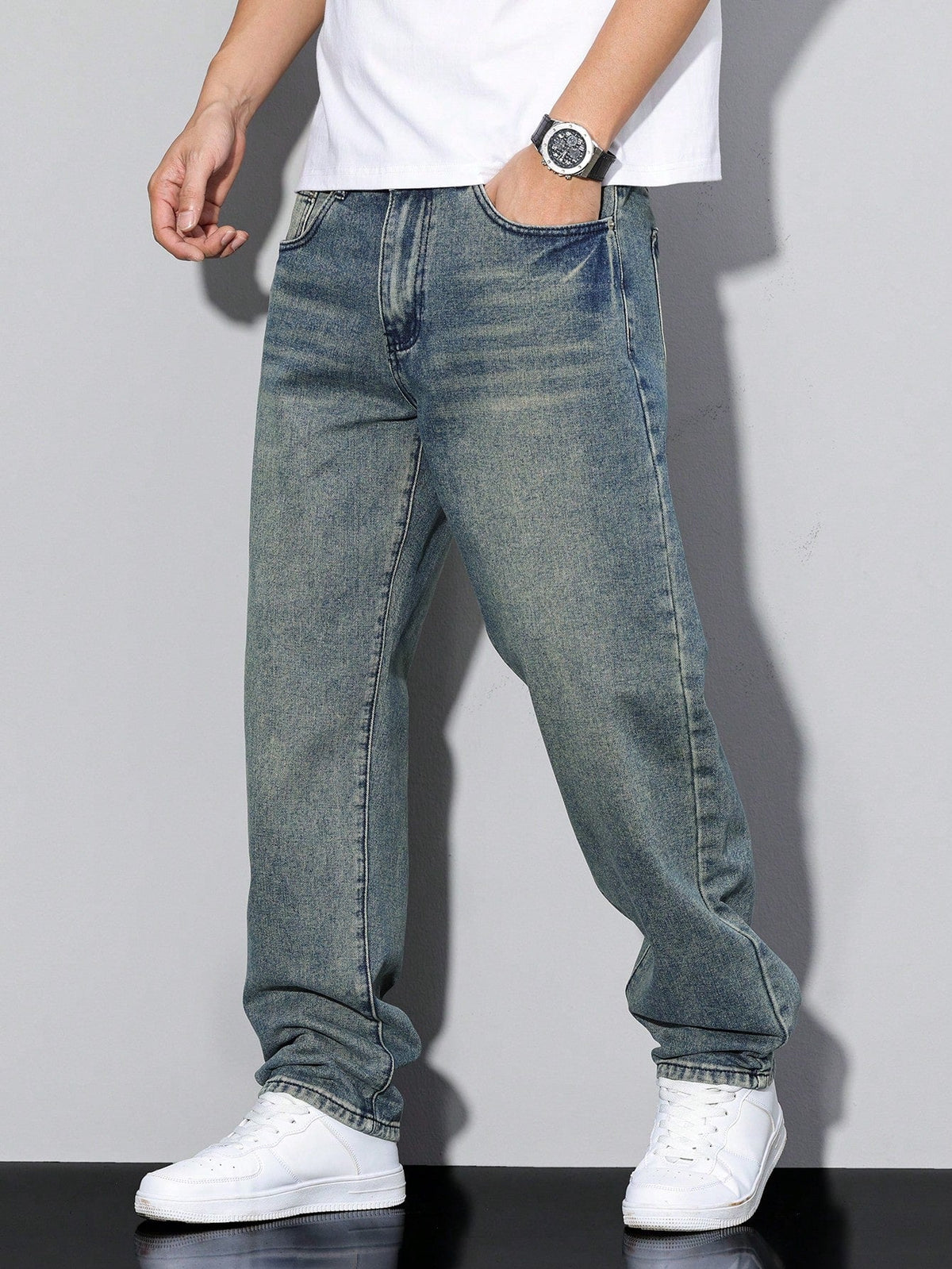Men's baggy denim jeans by Kate and Wendy with zip fly and five-pocket design, showcasing relaxed fit and classic denim style.