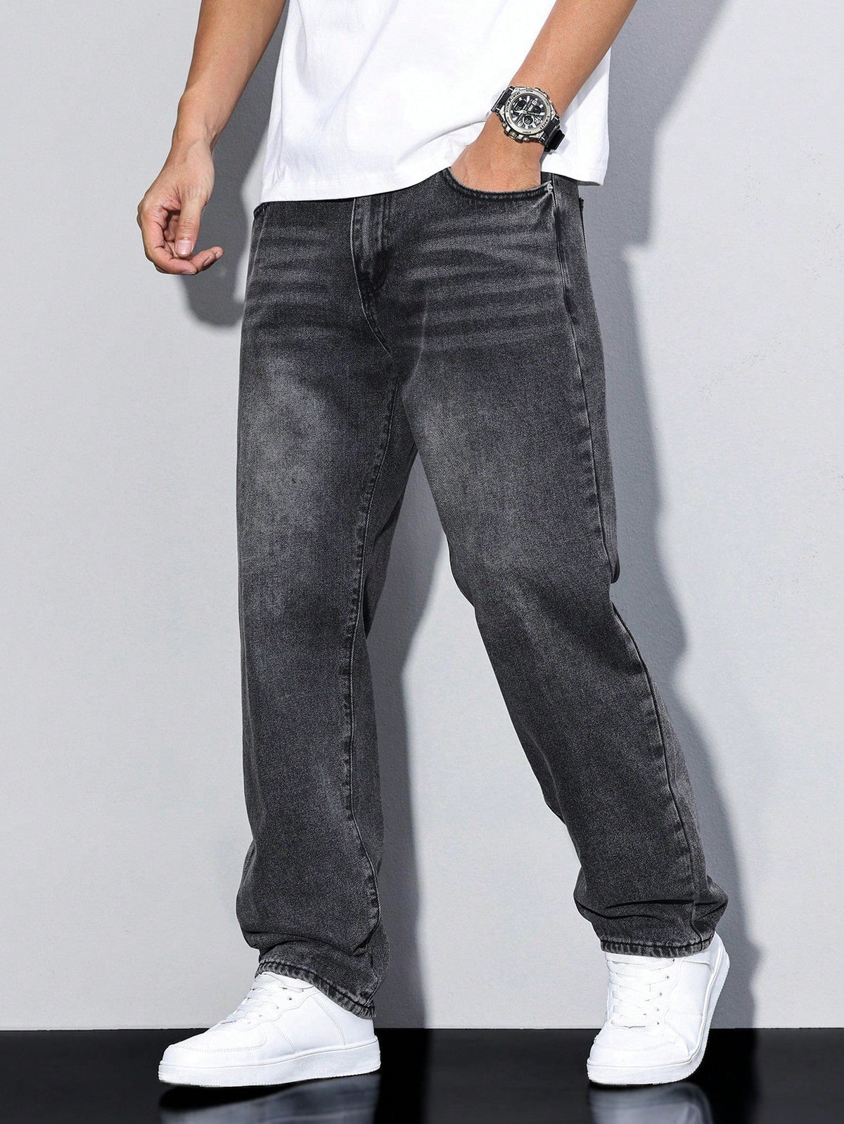 Men's baggy denim jeans by Kate and Wendy featuring a zip fly and five-pocket design, shown in a relaxed fit style.