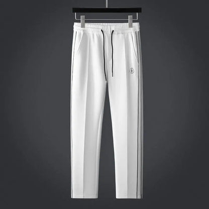 Men's breathable Lycra track suit by Homixa featuring a zip-up jacket and matching joggers, ideal for active wear.
