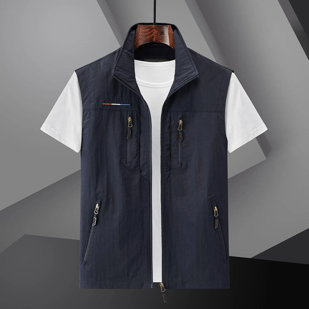 Men's Homixa casual utility vest with multiple functional pockets and a relaxed fit, displayed on a model.