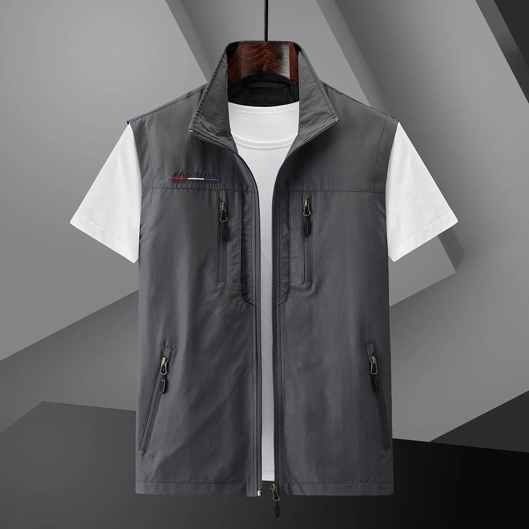 Men's casual utility vest by Homixa with multiple functional pockets, relaxed fit, and durable fabric, suitable for outdoor and everyday wear.