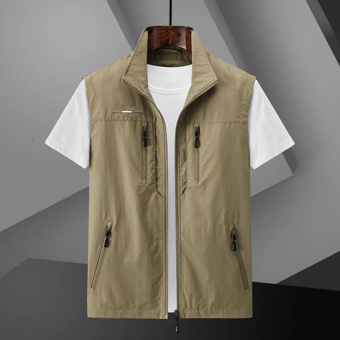 Men's casual utility vest by Homixa with multiple functional pockets and a relaxed fit, shown on a model.