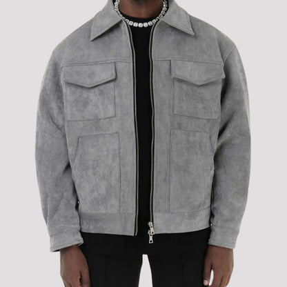 Men's faux suede trucker jacket by Homixa with shirt collar, zip front, and four pockets, displayed on a neutral background.