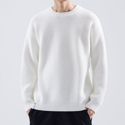 Men's Homixa fine-textured crew-neck sweater with ribbed collar, cuffs, and hem, showcasing a comfortable and stylish knit design.