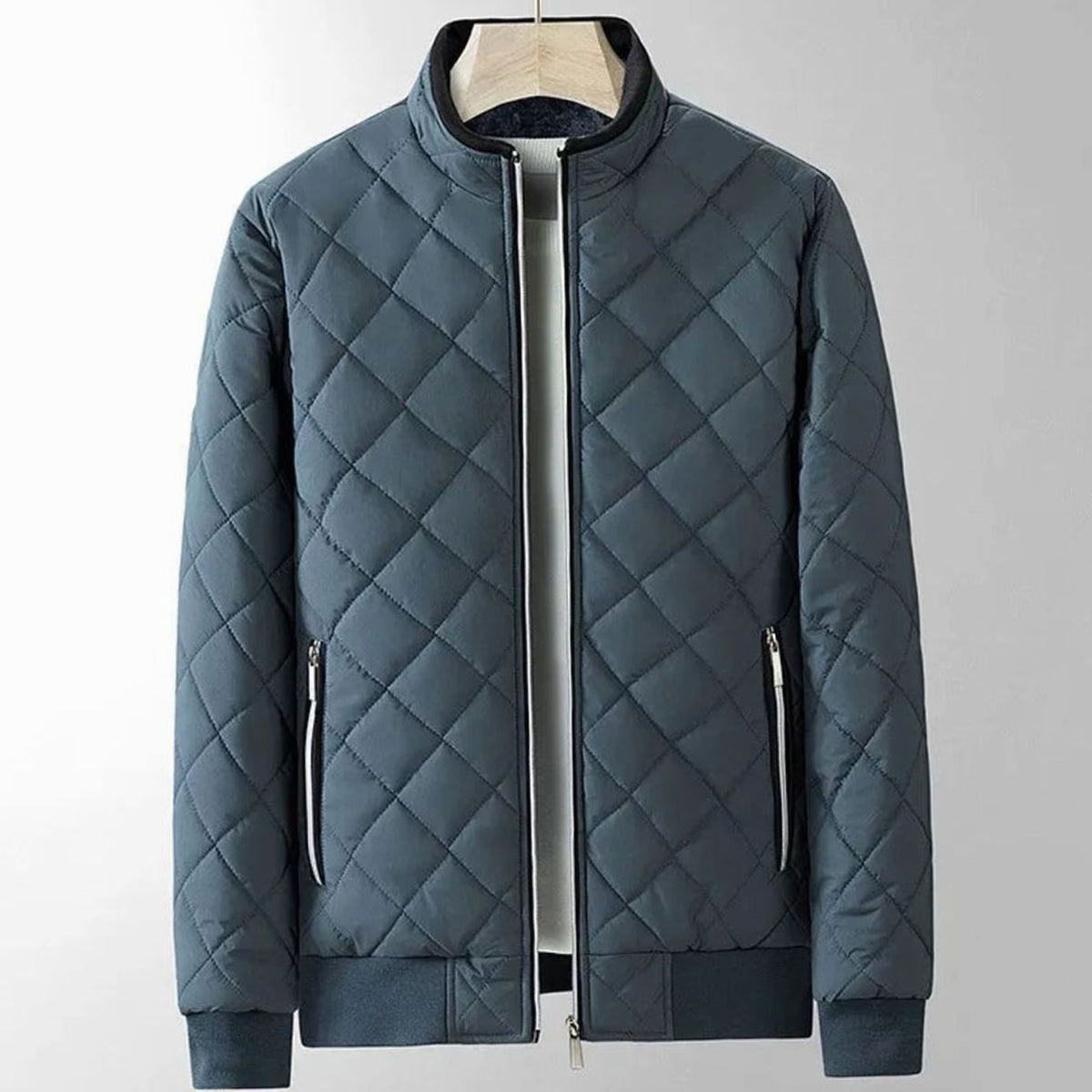 Men's fitted diamond-stitch quilted zip-up bomber jacket with ribbed cuffs by Homixa, shown on a model.
