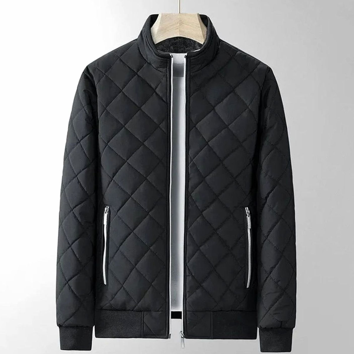 Men's fitted diamond-stitch quilted zip-up bomber jacket with ribbed cuffs, stylish Homixa men's bomber jacket on a model.