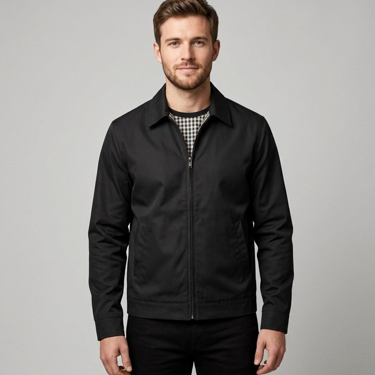 Men's Homixa Harrington bomber jacket with plaid lining, zip front, and angled pockets, displayed on a mannequin.
