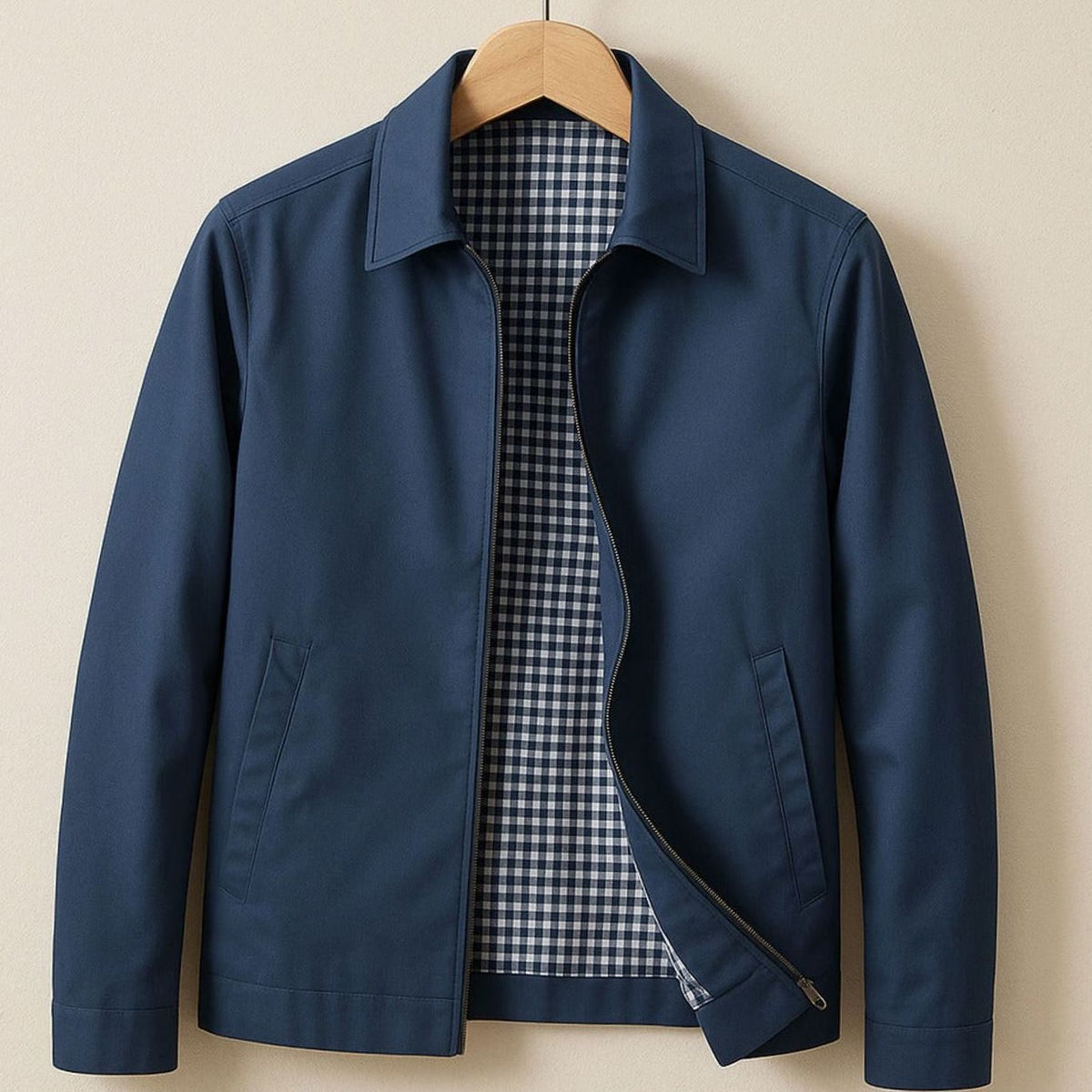 Men's Homixa Harrington bomber jacket with plaid lining, zip front, and angled pockets, shown on a model.