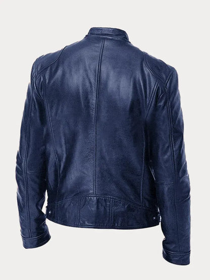 Men's leather jacket by Homixa featuring a stand collar, zip front, and four zippered pockets, shown on a model.