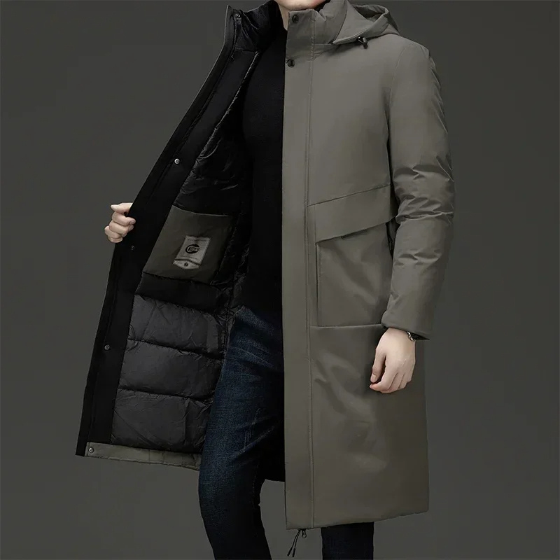 Men's Homixa long puffer coat with quilted lining and adjustable drawstring hood, perfect for cold weather.