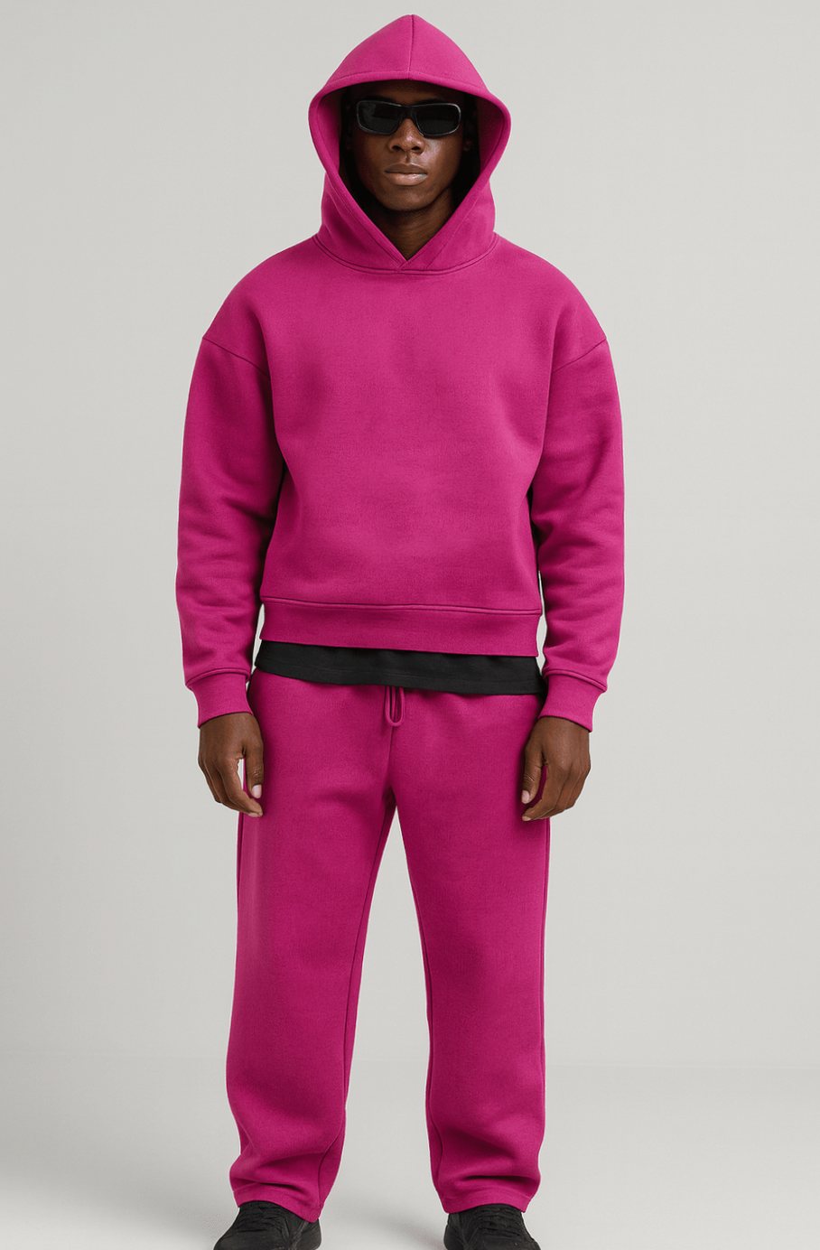 Men's oversized fleece tracksuit set by Homixa featuring a drawstring hoodie and elastic-waist joggers, casual and comfortable.