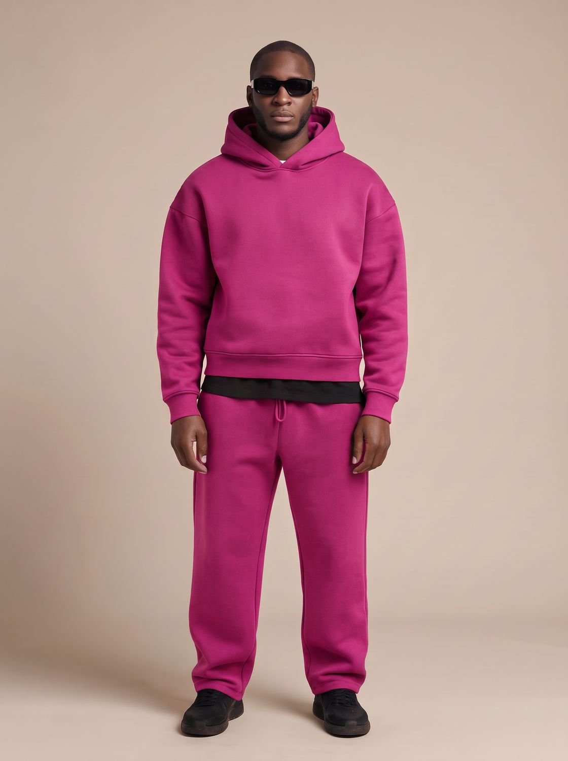 Men's oversized Homixa tracksuit with drawstring hoodie and elastic-waist joggers, casual athletic wear for relaxed style.