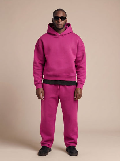 Men's oversized Homixa tracksuit with drawstring hoodie and elastic-waist joggers, casual athletic wear for relaxed style.