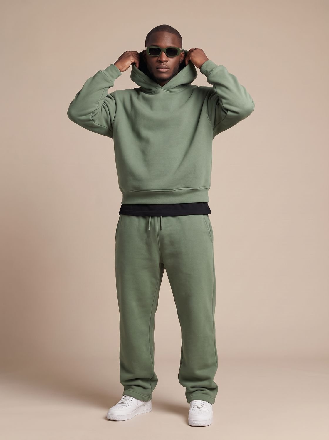 Men's oversized Homixa track suit with drawstring hoodie and elastic-waist joggers, featuring a comfortable, casual fit.