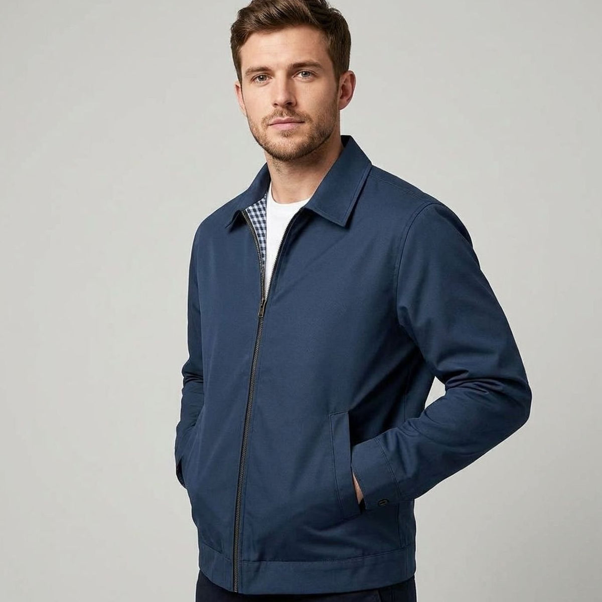 Men's plaid-lined Harrington bomber jacket with zip front and shirt collar, by Homixa, shown on a model.