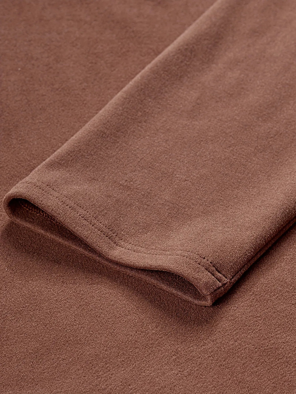 Men's Homixa quarter-zip sweater featuring color-block knit, geometric trim, and stand collar for stylish, casual wear.