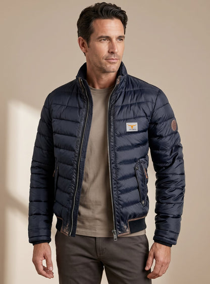 Men's quilted winter puffer jacket by Homixa featuring stand collar, zip front, and buttoned chest pockets in a stylish design.