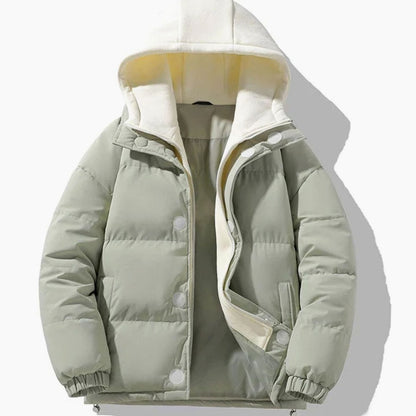 Men's relaxed-fit quilted puffer jacket with contrast hood and wind-resistant shell, by Homixa, displayed on a model.