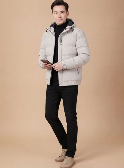 Men's relaxed-fit quilted winter jacket by Homixa with drawstring hood and padded interior, suitable for cold weather.