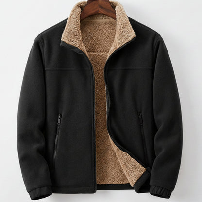 Men's Sherpa-lined full-zip fleece jacket with relaxed fit and side-zip pockets, by Homixa, shown in a cozy, casual outdoor setting.