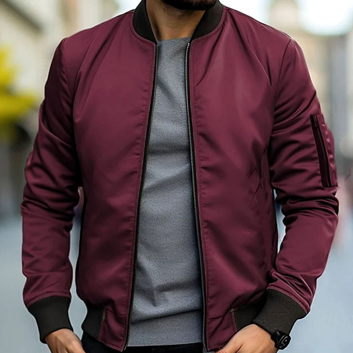 Men's short-cut bomber jacket by Homixa featuring a full zip, ribbed cuffs, collar, and hem, displayed on a hanger.