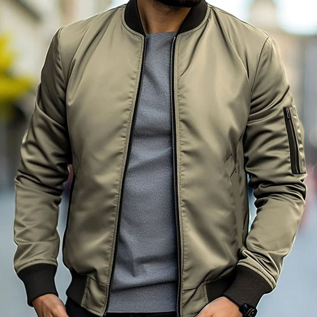 Men's short-cut bomber jacket by Homixa with full zip, ribbed collar, cuffs, and hem, displayed on a model.