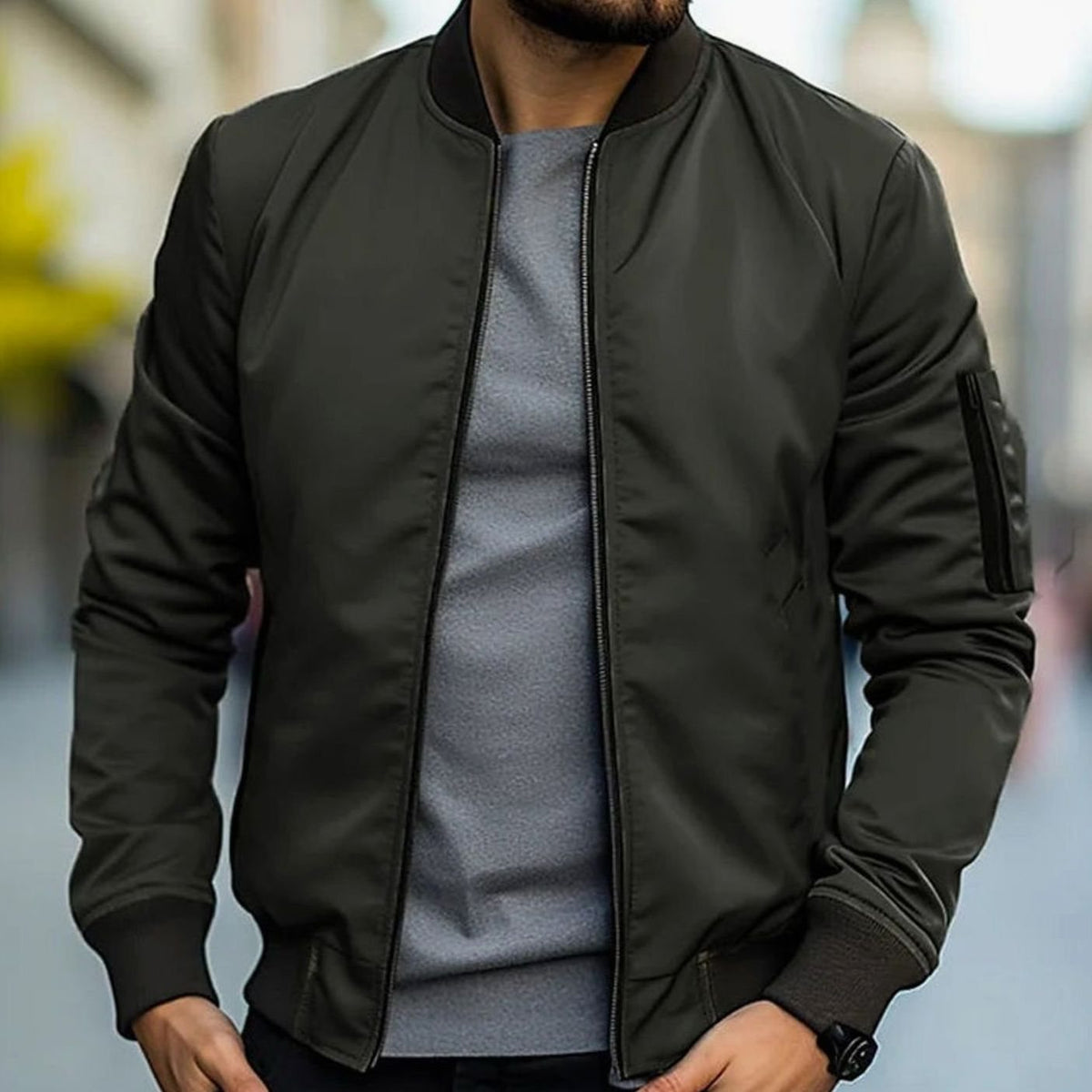 Men's short-cut bomber jacket by Homixa with full zip, ribbed collar, cuffs, and hem, shown in a casual style.
