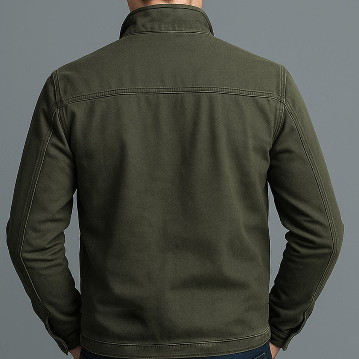 Men's slim-fit bomber jacket by Homixa featuring a stand collar and two zippered chest pockets, shown on a male model.