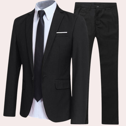 Men's slim-fit two-piece set by Homixa featuring a matching blazer and tailored trousers, displayed on a male mannequin.