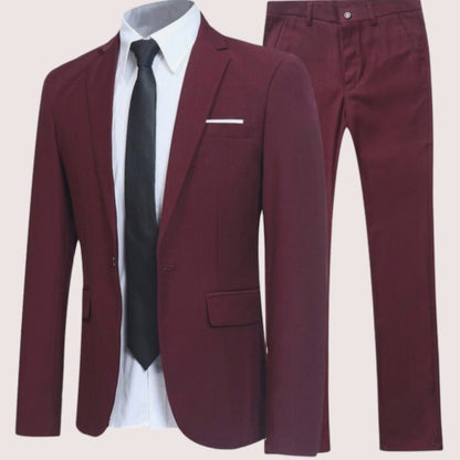 Men's slim-fit two-piece set by Homixa featuring a matching blazer and tailored trousers, shown on a male model.