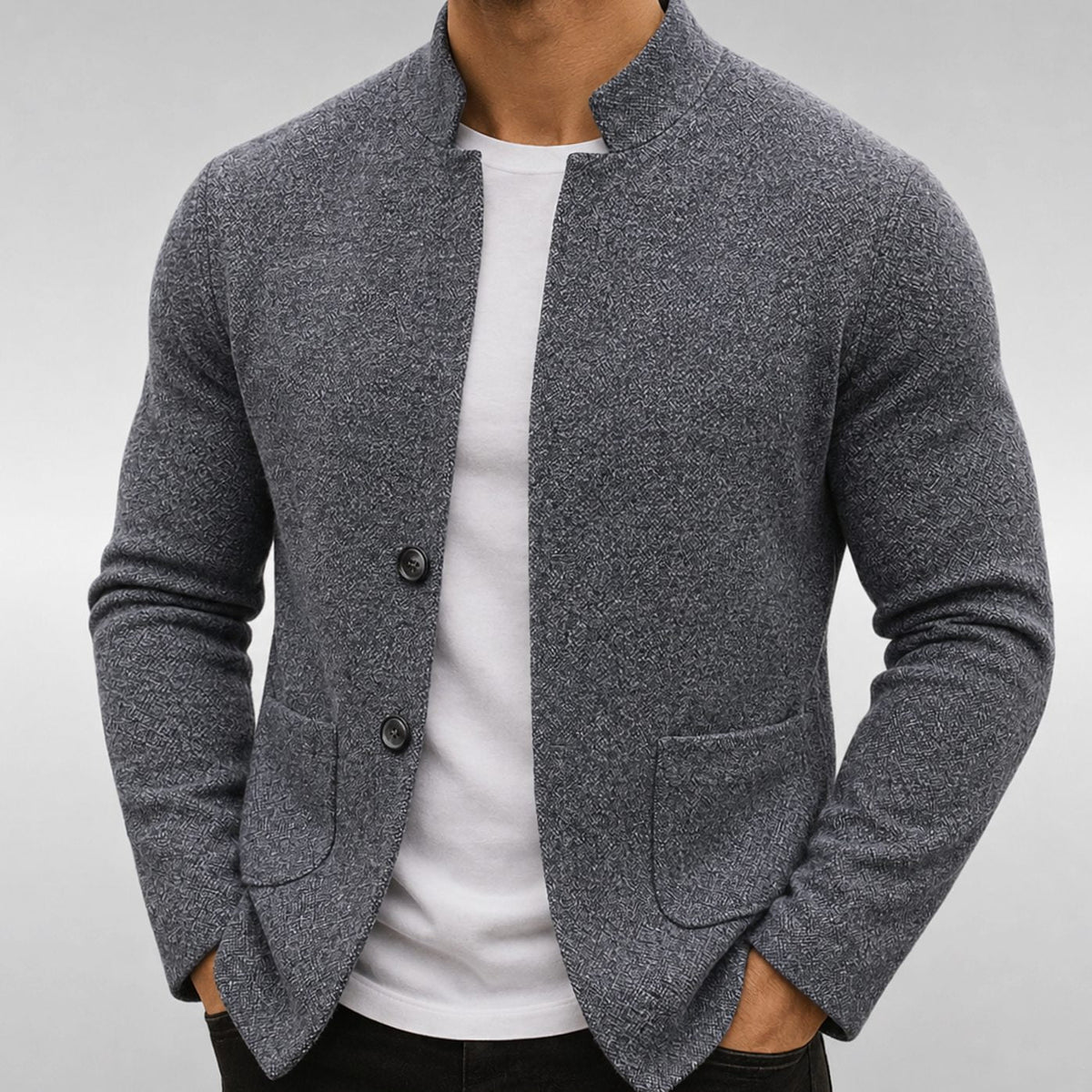 Men's textured knit cardigan jacket by Homixa with stand collar, button front, and twin patch pockets, shown on a model.
