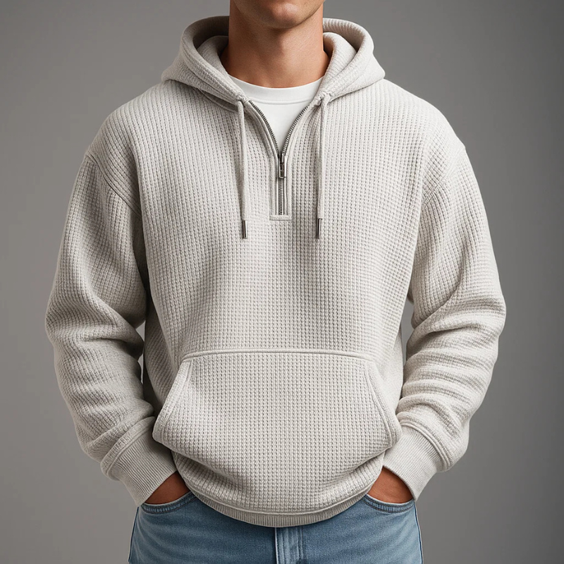 Men's waffle-knit half-zip hoodie by Homixa with drawstring hood and kangaroo pocket, shown in a casual front view.