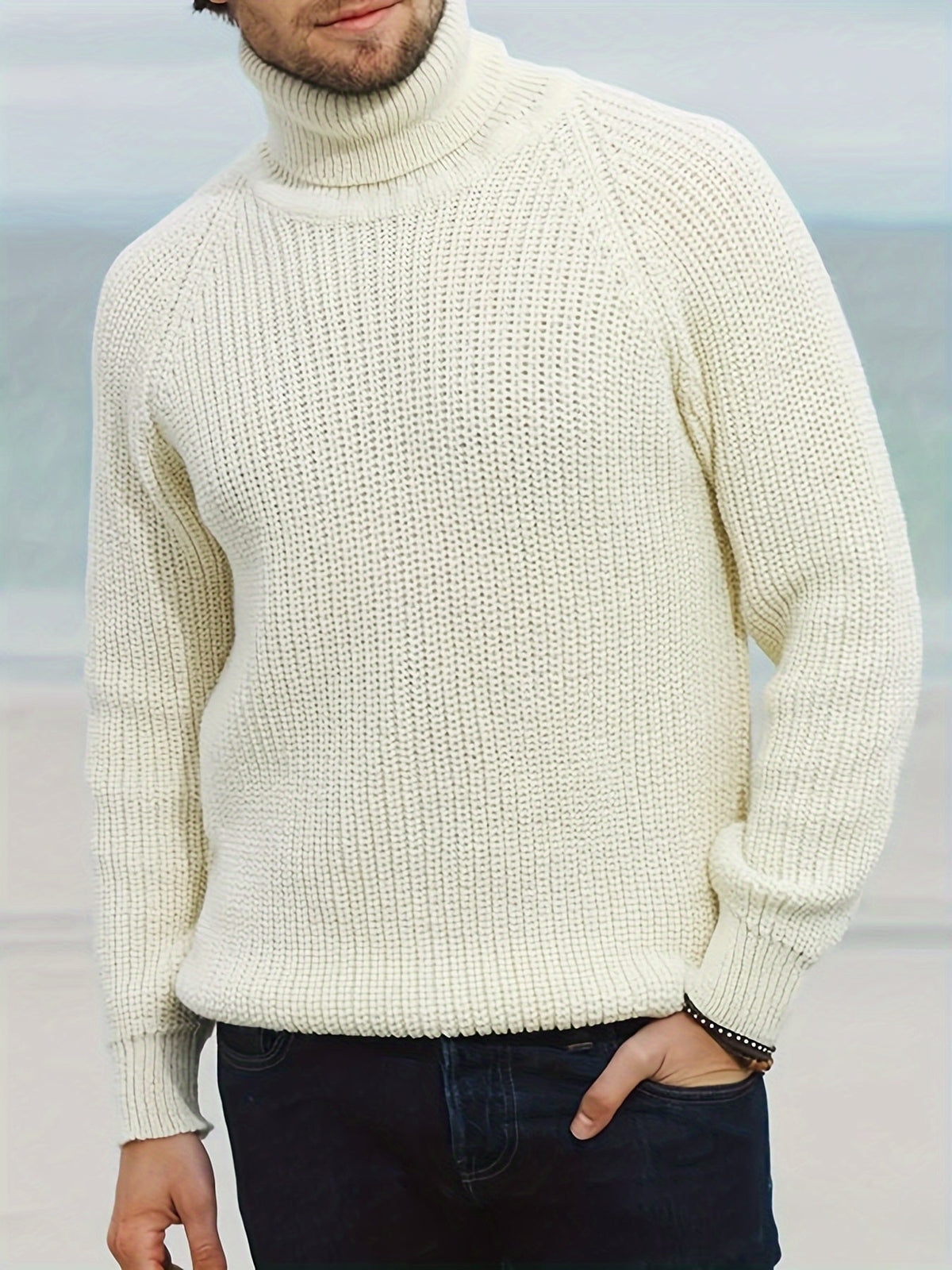 Men's waffle-knit turtleneck sweater by Homixa featuring ribbed trim at hem and cuffs, shown in a close-up of the textured fabric.