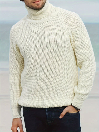 Men's waffle-knit turtleneck sweater by Homixa featuring ribbed trim at hem and cuffs, shown in a close-up of the textured fabric.
