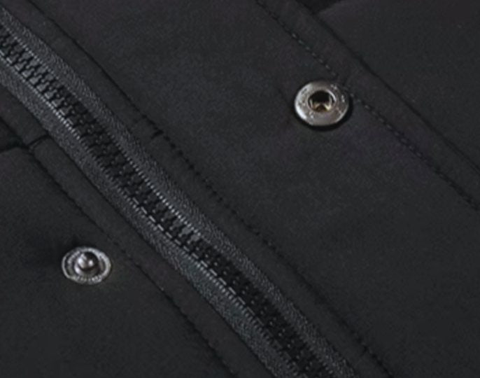 Men's windproof fur-lined hooded winter parka by Homixa with quilted padding and zip pockets, suitable for cold weather conditions.